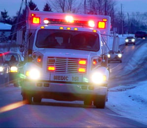 photo ambulance on snowy road